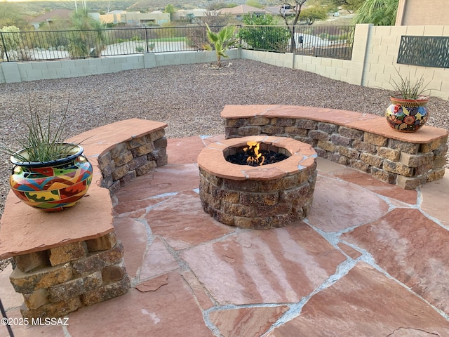 37790 S Desert Bluff Dr, Tucson, AZ 85739 - view of patio / terrace featuring a fenced backyard and an outdoor fire pit