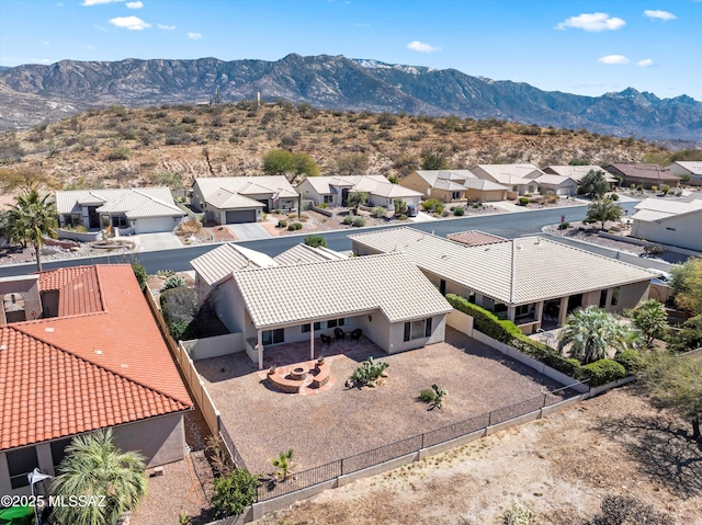 bird's eye view with a residential view and a mountain view