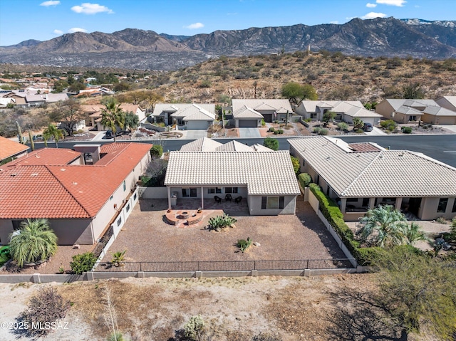 drone / aerial view featuring a mountain view and a residential view