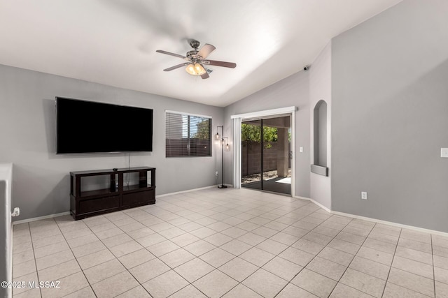 unfurnished living room featuring light tile patterned flooring, ceiling fan, baseboards, and lofted ceiling