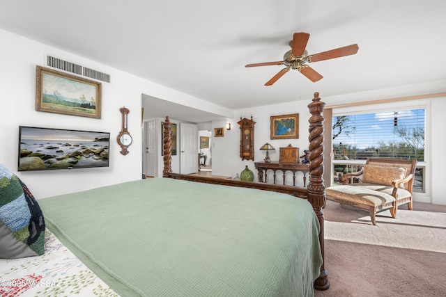 carpeted bedroom with visible vents and ceiling fan