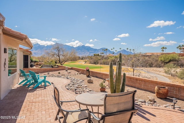 view of patio featuring a mountain view