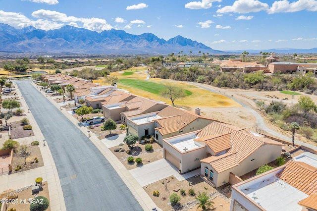 birds eye view of property featuring a mountain view and a residential view