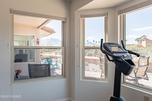 workout room with a textured wall