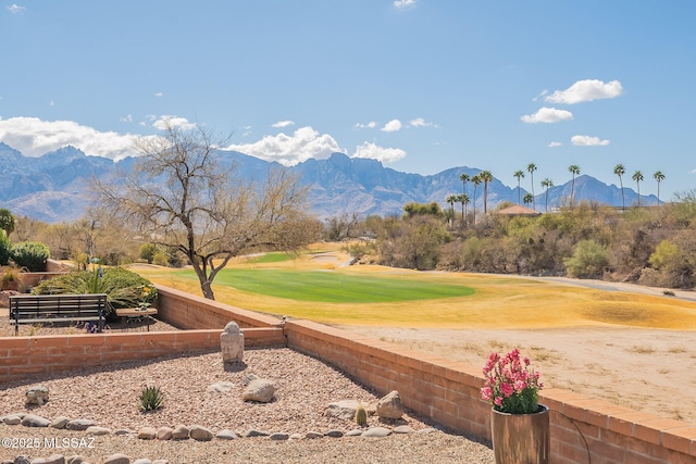 property view of mountains featuring view of golf course