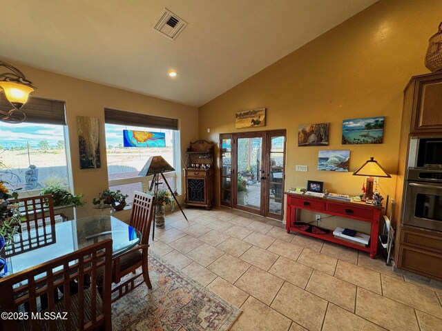 kitchen featuring brown cabinets, a sink, open shelves, stainless steel gas stovetop, and a peninsula