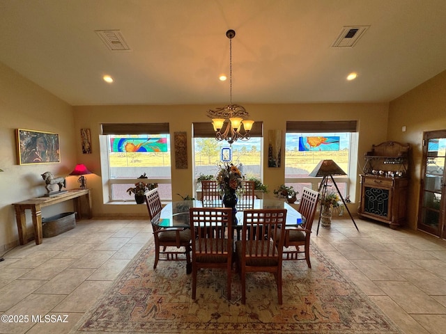 dining area with an inviting chandelier, recessed lighting, visible vents, and lofted ceiling