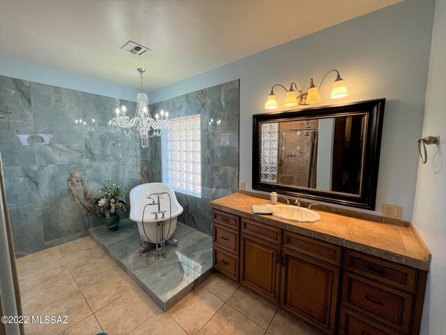 bedroom with tile patterned flooring, visible vents, a fireplace, and a ceiling fan