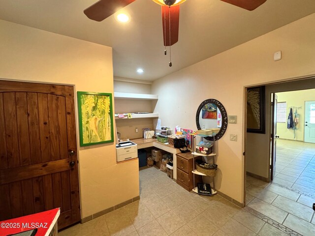 bedroom featuring ceiling fan and carpet