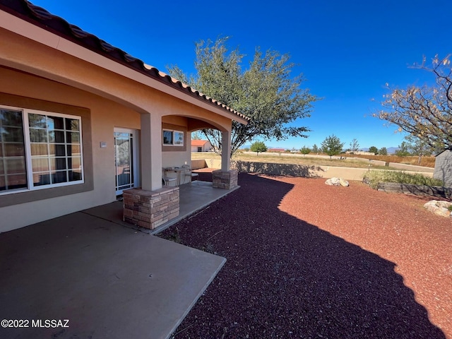 view of yard with a patio