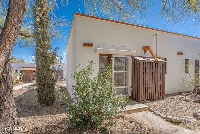 view of front of home featuring stucco siding