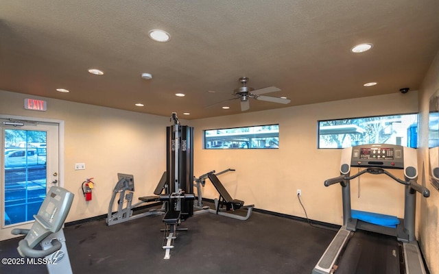 exercise room with recessed lighting, a textured ceiling, baseboards, and ceiling fan