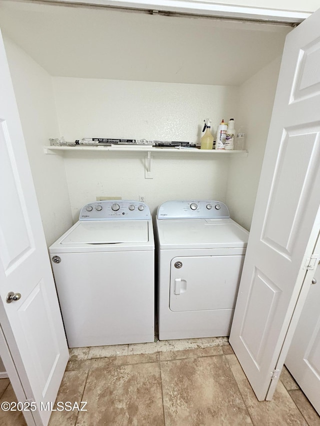 laundry area featuring laundry area and washing machine and clothes dryer