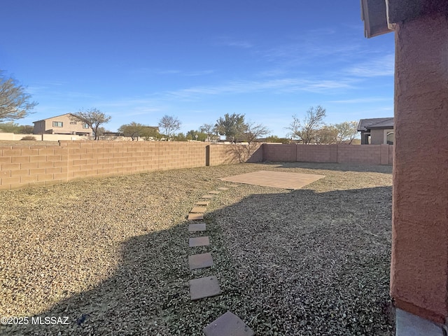 view of yard featuring a fenced backyard