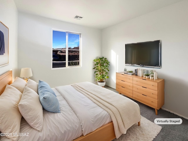 bedroom featuring carpet and visible vents