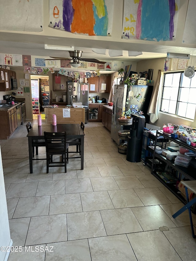 dining space with light tile patterned floors