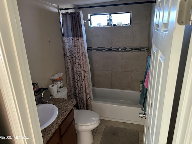 bathroom with tile patterned flooring, toilet, vanity, and shower / bath combo with shower curtain