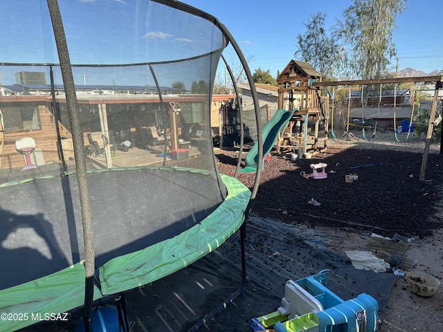 view of play area with a trampoline