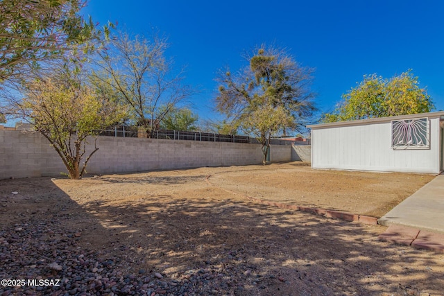 view of yard featuring a fenced backyard