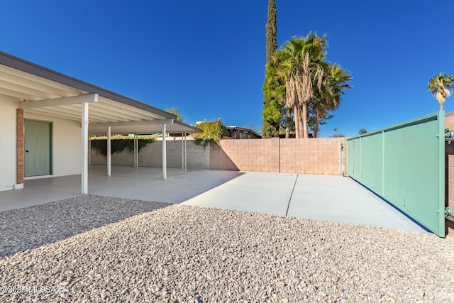 view of yard with a patio and a fenced backyard