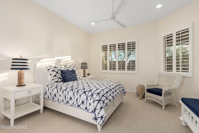 bedroom featuring multiple windows, carpet, baseboards, and recessed lighting