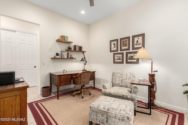 office space with baseboards, wood finished floors, recessed lighting, and a ceiling fan