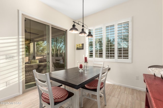 dining space with baseboards