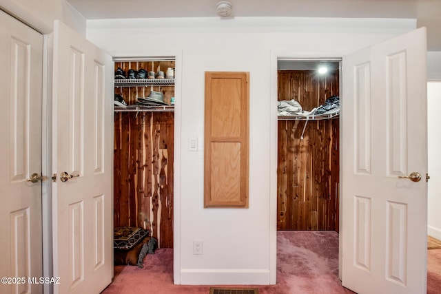 closet featuring visible vents