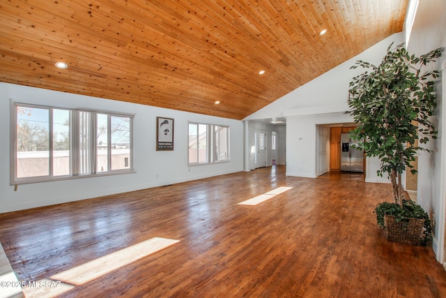 unfurnished living room featuring baseboards, high vaulted ceiling, wood ceiling, and wood finished floors