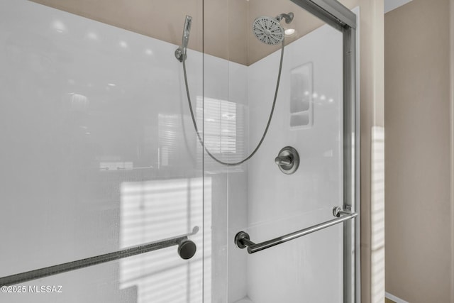 interior details with a shower stall