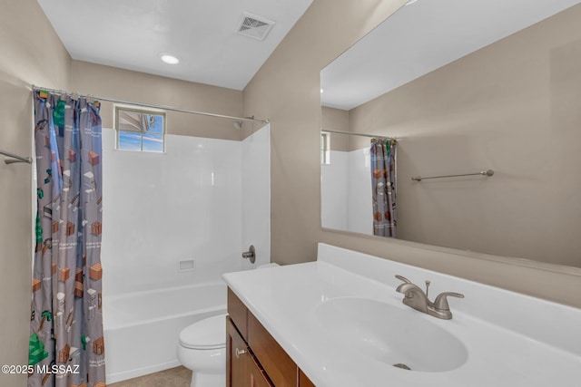 bathroom featuring vanity, toilet, shower / bathtub combination with curtain, and visible vents