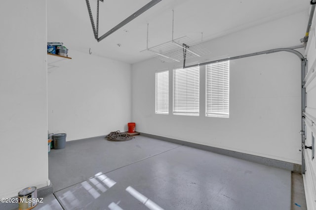 garage with baseboards