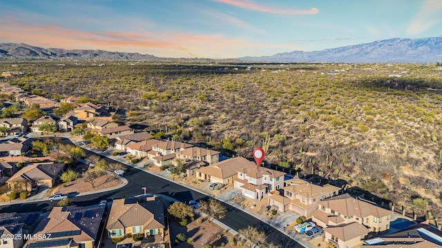 birds eye view of property featuring a mountain view and a residential view