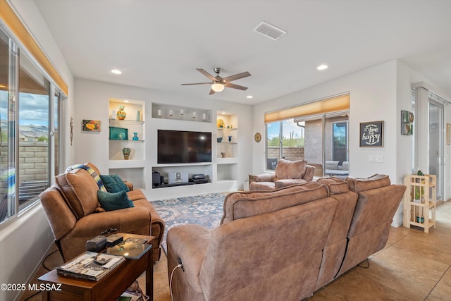 tiled living room with visible vents, recessed lighting, a ceiling fan, and built in features