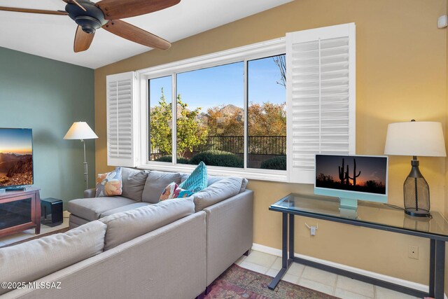 499 W Windowmaker Rd, Tucson, AZ 85737 - tiled living area with ceiling fan and baseboards