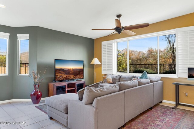 499 W Windowmaker Rd, Tucson, AZ 85737 - living room with baseboards, a ceiling fan, and tile patterned flooring