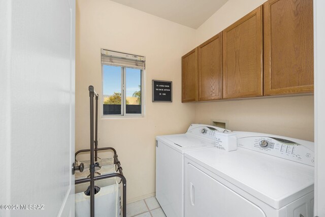 499 W Windowmaker Rd, Tucson, AZ 85737 - clothes washing area featuring independent washer and dryer, baseboards, and cabinet space