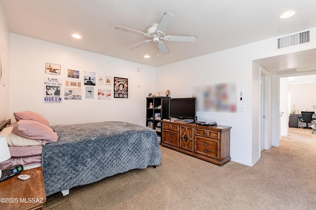 carpeted bedroom featuring visible vents, recessed lighting, and a ceiling fan