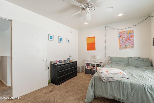 carpeted bedroom featuring a ceiling fan and recessed lighting