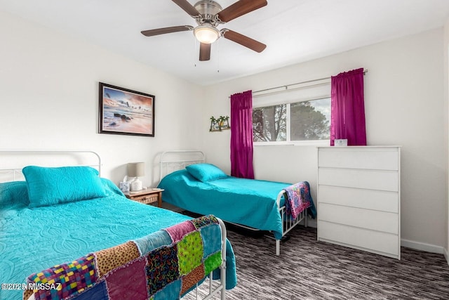 bedroom featuring baseboards, a ceiling fan, and carpet floors