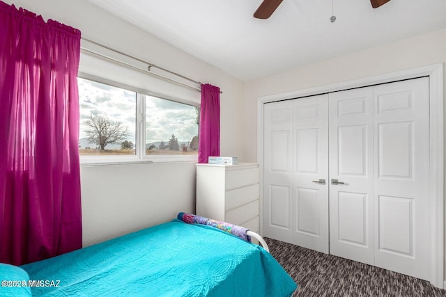 bedroom with a closet, carpet, and a ceiling fan