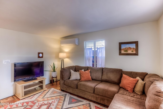 living area with light tile patterned floors and a wall mounted AC