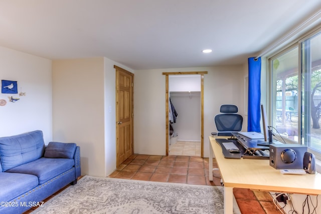 home office featuring light tile patterned flooring and recessed lighting