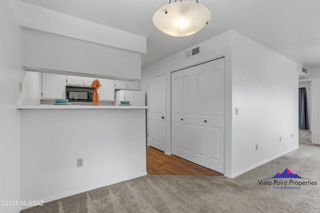 5751 N Kolb Rd # 33207, Tucson, AZ 85750 - interior space with carpet flooring and visible vents