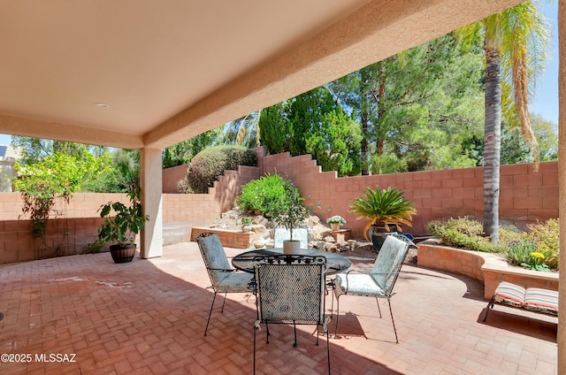 11092 N Eagle Crest Dr, Tucson, AZ 85737 - fenced backyard featuring a patio and outdoor dining area