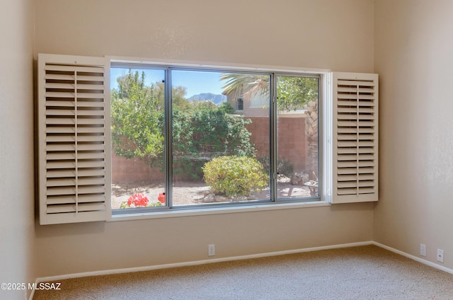 11092 N Eagle Crest Dr, Tucson, AZ 85737 - spare room with carpet flooring and baseboards