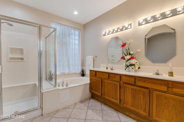 11092 N Eagle Crest Dr, Tucson, AZ 85737 - bathroom featuring a shower stall, a garden tub, double vanity, and tile patterned floors