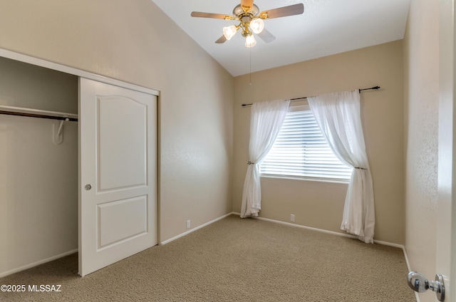 11092 N Eagle Crest Dr, Tucson, AZ 85737 - unfurnished bedroom featuring carpet floors, a closet, baseboards, vaulted ceiling, and ceiling fan