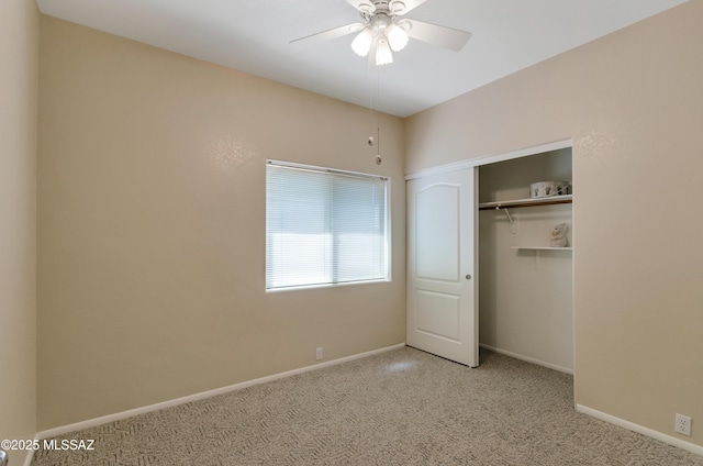 11092 N Eagle Crest Dr, Tucson, AZ 85737 - unfurnished bedroom with light colored carpet, a closet, baseboards, and a ceiling fan