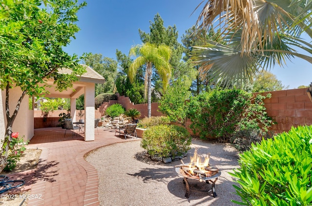 11092 N Eagle Crest Dr, Tucson, AZ 85737 - fenced backyard with a fire pit, a patio, and a gazebo
